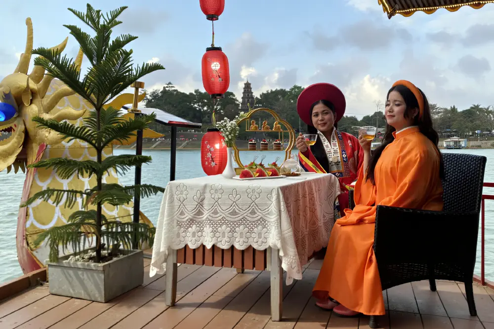 Two Women wearing Traditional Clothes at the High Tea Afternoon Tour