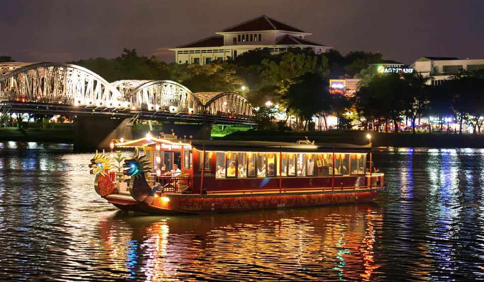Dragon boat cruising the Perfume River at night